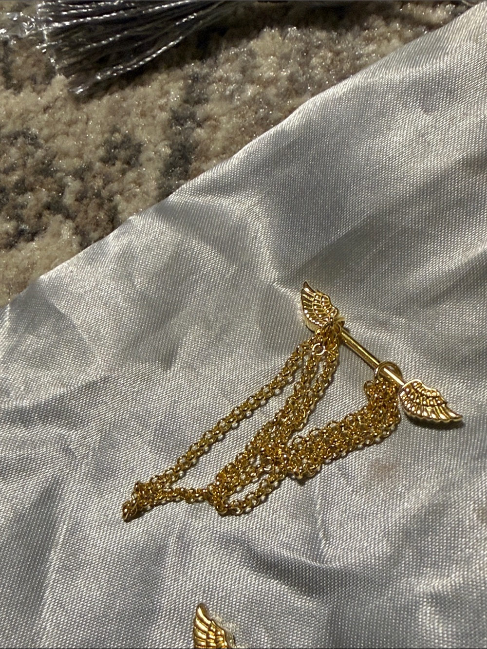 Gold angel wing with chain nipple rings